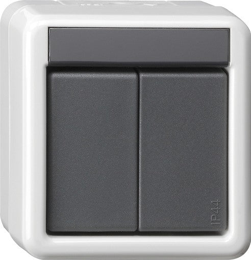 Acoplador de bus de pulsador montaje en superficie protegido del agua de 2 elementos, con mando de 2 puntos para KNX Gira – ref. 516230